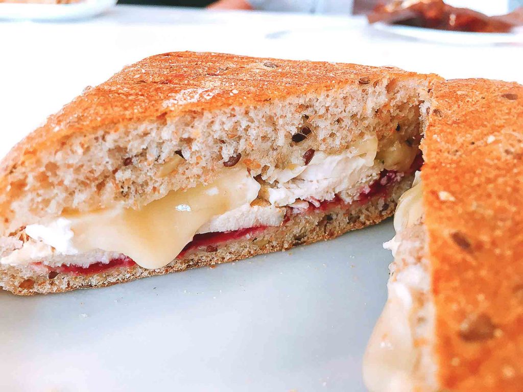 Chicken Cranberry Brie Panini at The Rustic Rooster | tryhiddengems.com