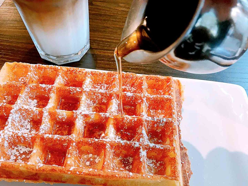 Brussels Waffle with Maple Syrup at Le Petit Belge | tryhiddengems.com